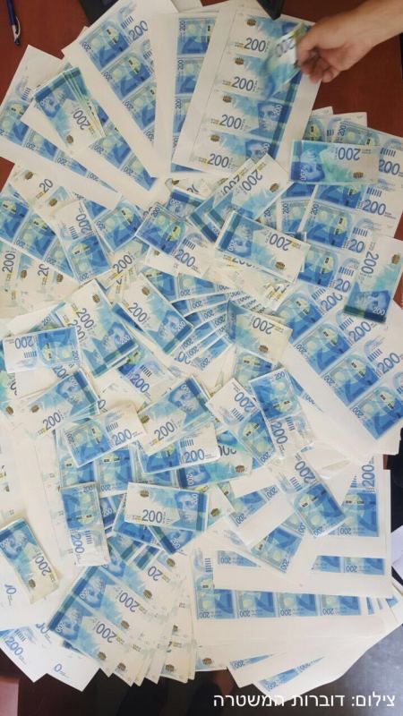 تحذير: الاف الشواقل من فئة 200 وفئة 100دولار مزيفة